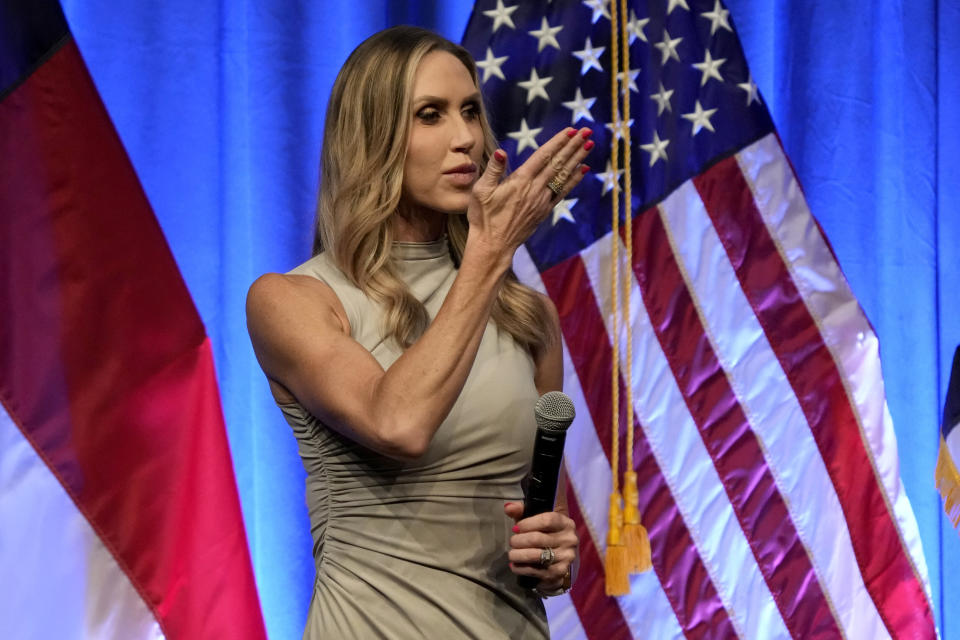 Lara Trump gestures as she leaves the North Carolina GOP convention in Greensboro, N.C., Friday, May 24, 2024. (AP Photo/Chuck Burton)