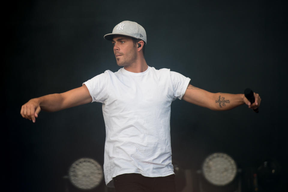 BIRMINGHAM, UNITED KINGDOM - AUGUST 31: Max George of The Wanted performs onstage during day 2 of Fusioni Festival 2014 on August 31, 2014 in Birmingham, England. (Photo by Ollie Millington/Redferns via Getty Images)