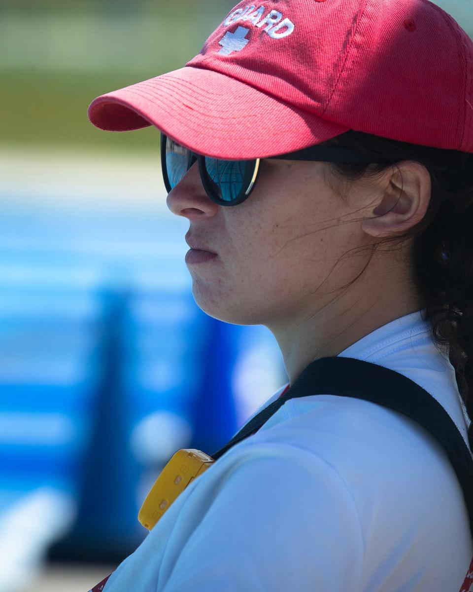 Victoria Swigart stands watch at the Panama City Beach Aquatic Center. The center had about 50 open positions as of Tuesday morning.