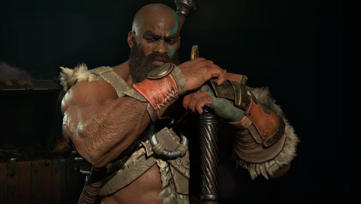  Bearded, Kratos-like Diablo barbarian resting his hands on the pommel of an upturned weapon, looking stoic and wrathful 