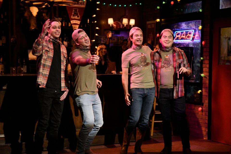 From left to right, Pete Davidson, musical guest Morgan Wallen, host Jason Bateman as future Morgan, and Bowen Yang as future Morgan during "Saturday Night Live"s "Morgan Wallen Party" sketch on Dec. 5, 2020.