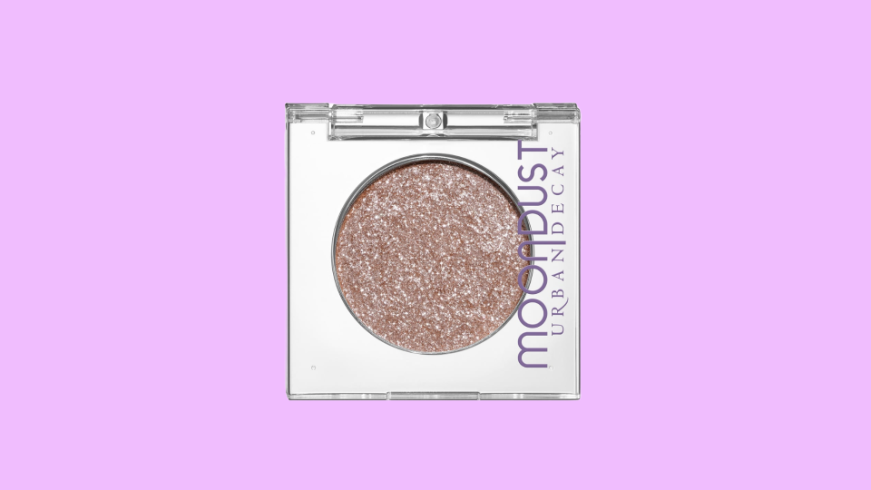 For a sparkly sheen, dust the Urban Decay 24/7 Moondust Eyeshadow in "Space Cowboy" across your lids.