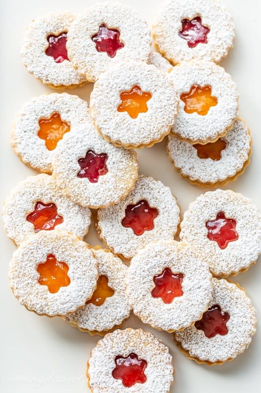 <p>Saving Room For Dessert</p><p>Such a classic, pretty cookie on any plate.</p><p><strong>Get the recipe: <a href="https://www.savingdessert.com/old-world-linzer-cookies/" rel="nofollow noopener" target="_blank" data-ylk="slk:Old World Linzer Cookies;elm:context_link;itc:0;sec:content-canvas" class="link rapid-noclick-resp">Old World Linzer Cookies</a></strong></p><p><strong>Related: <a href="https://parade.com/food/food-gifts-for-christmas" rel="nofollow noopener" target="_blank" data-ylk="slk:55 Best Edible Christmas Gifts;elm:context_link;itc:0;sec:content-canvas" class="link rapid-noclick-resp">55 Best Edible Christmas Gifts</a></strong></p>