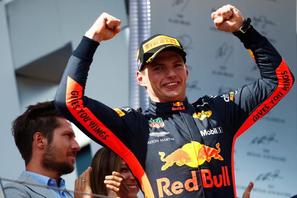 Smile if you’re winning: Max Verstappen after picking up his fourth F1 F1 winner’s trophy, at Red Bull’s home circuit in Austria