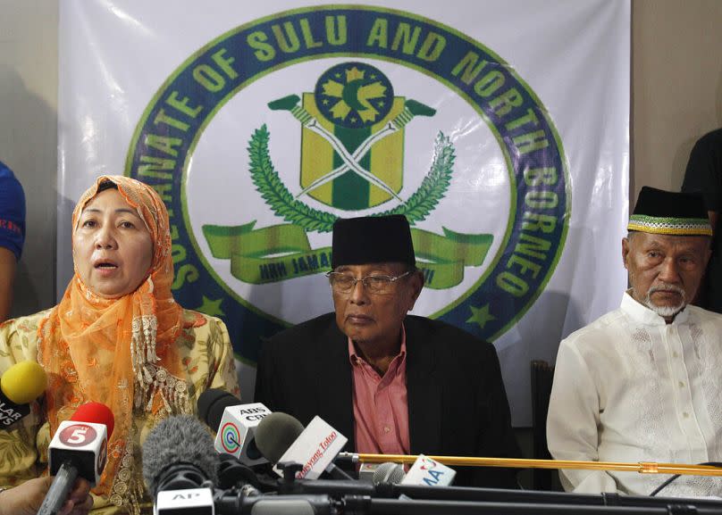 Sultanate of Sulu heirs speaks to reporters at his house in suburban Taguig, south of Manila, February 2013