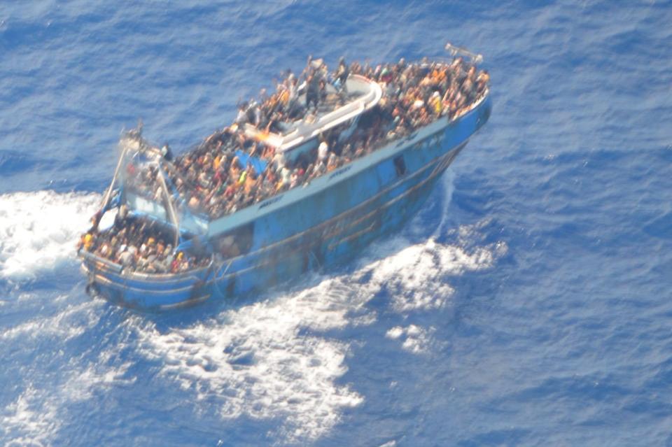 KALAMATA, GREECE - JUNE 15: (----EDITORIAL USE ONLY MANDATORY CREDIT - 'GREEK COAST GUARD / HANDOUT' - NO MARKETING NO ADVERTISING CAMPAIGNS - DISTRIBUTED AS A SERVICE TO CLIENTS----) A photo shows the boat carrying migrants before it sank, in Kalamata, Greece on June 15, 2023. Rescued immigrants of a shipwreck after a boat carrying dozens of migrants sank in international waters of Ionian Sea, sit inside a warehouse. Greece has declared three days of mourning, the interim prime minister's office said on June 14, over a migrant boat sinking in the Ionian Sea feared to have claimed hundreds of lives. The Greek coastguard has so far recovered 79 bodies and rescued over 100, but survivors are claiming that up to 750 people were on board. The death toll from the sinking of a fishing boat crammed with migrants off the coast of southwestern Greece rose to 79, local media reported on Wednesday. (Photo by Greek Coast Guard/Handout/Anadolu Agency via Getty Images)