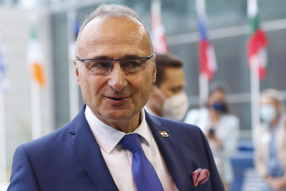 Croatia's Foreign Minister Gordan Grlic Radman arrives for a European Foreign Affairs Ministers meeting at the European Council building in Luxembourg, Monday, June 21, 2021. EU foreign ministers were set to approve Monday a new set of sanctions against scores of officials in Belarus and prepare a series of measures aimed at the country's economy. (Johanna Geron/Pool Photo via AP)