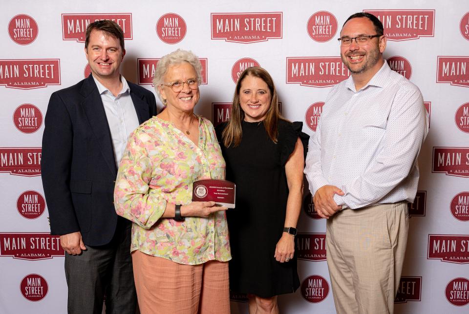 Pictured with the Main Street Alabama Award of Excellence for Excellence in Reinvestment, recognizing $20 million in private investment in downtown Gadsden in the last decade, are Downtown Gadsden Inc. board member Eric Wright, Director Kay Moore, board member Catherine Martin and board President Shane Ellison.