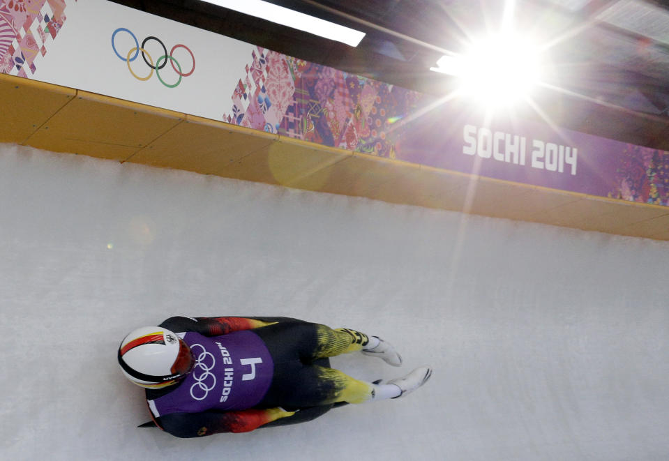 Felix Loch from Germany takes a turn during a training session for the men's singles luge at the 2014 Winter Olympics, Friday, Feb. 7, 2014, in Krasnaya Polyana, Russia. (AP Photo/Michael Sohn)