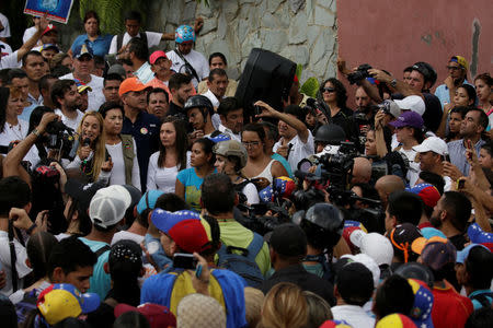 Lilian Tintori (L), wife of jailed Venezuelan opposition leader Leopoldo Lopez, speaks during a rally in support of political prisoners and against Venezuelan President Nicolas Maduro, outside the military prison of Ramo Verde, in Los Teques, Venezuela April 28, 2017. REUTERS/Marco Bello