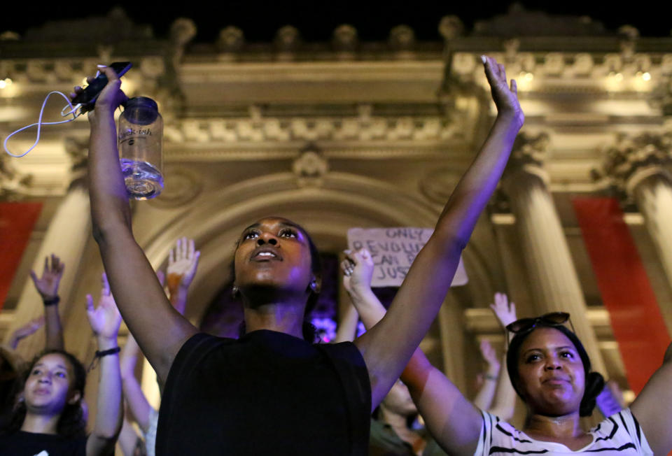 Activists gather in front of The Metropolitan Museum of Art as they march up 5th avenue in New York City.&nbsp;