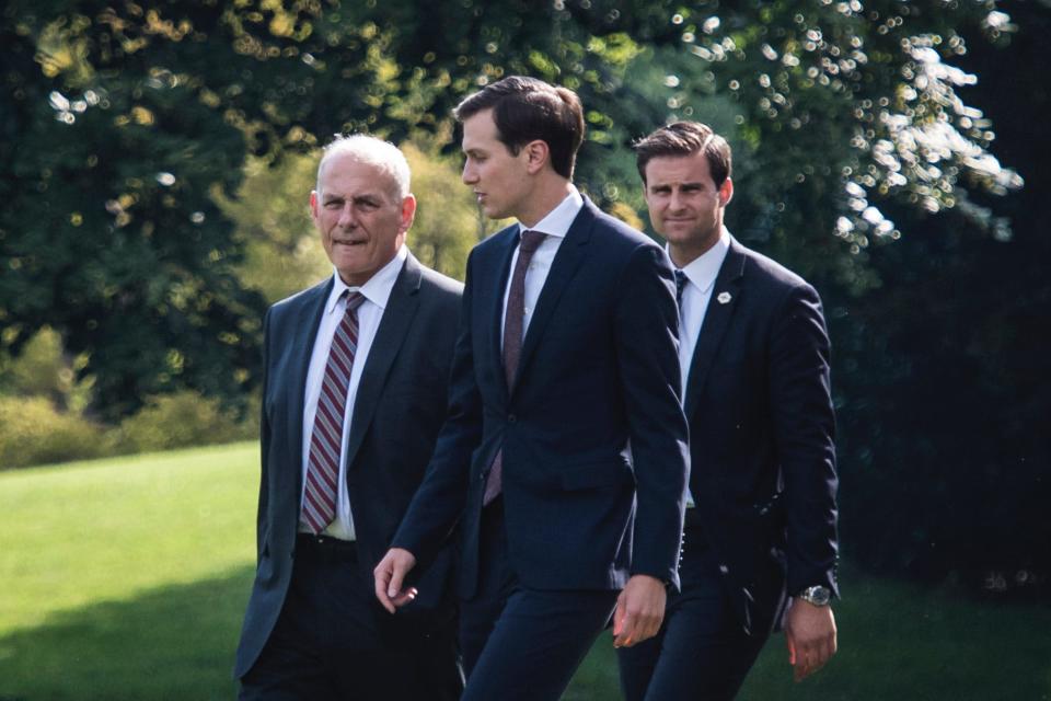 White House Chief of Staff John Kelly, White House senior adviser Jared Kushner, and White House aide John McEntee in 2017.