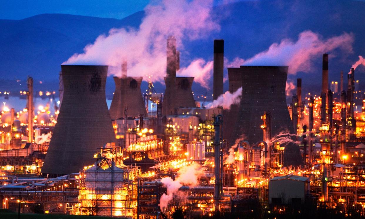 <span>Grangemouth oil refinery in Scotland. The report authors say the proposed levy could be easily administered within existing tax systems.</span><span>Photograph: Murdo Macleod/The Guardian</span>