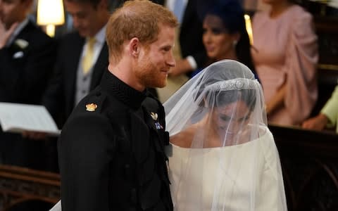 Meghan Markle meets Prince Harry at the altar - Credit: Dominic Lipinski /PA