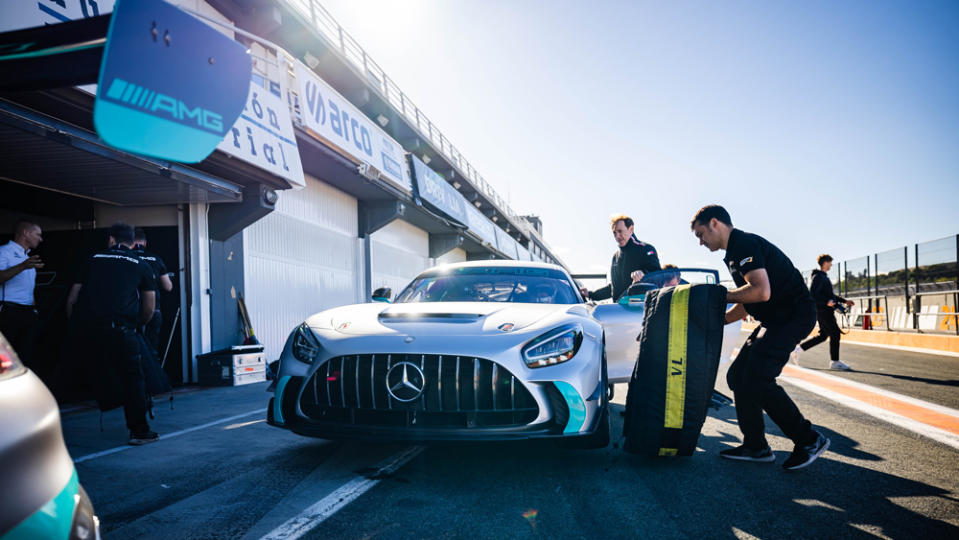 The 2024 Mercedes-AMG GT2 race car being prepped before being driven on track.