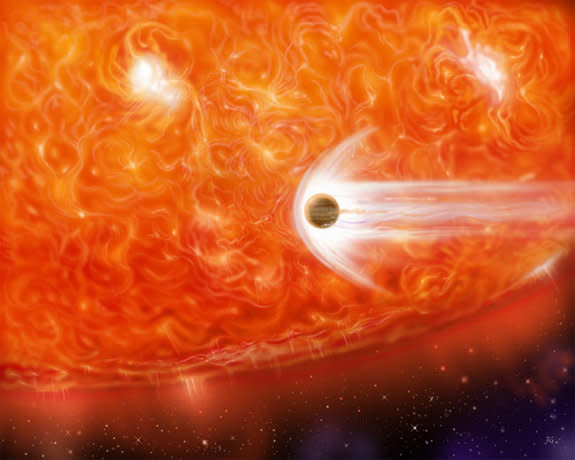 Giant Dying Star Caught Devouring Alien Planet