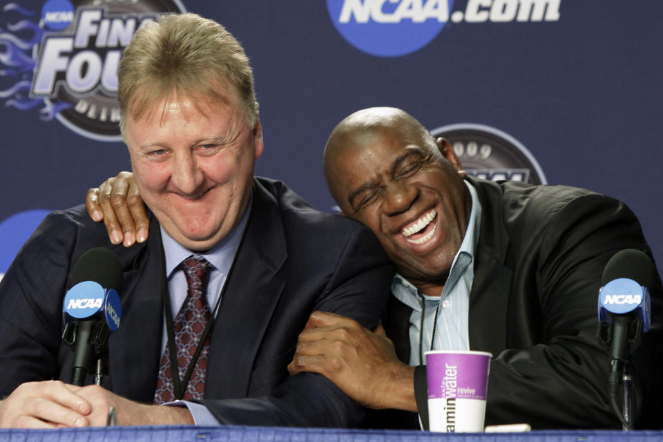 FILE - Former NBA players Earvin "Magic" Johnson, right, and Larry Bird laugh at a news conference before the championship game between Michigan State and North Carolina at the men's NCAA Final Four college basketball tournament April 6, 2009, in Detroit. (AP Photo/Amy Sancetta, File)