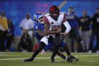 San Diego State quarterback Lucas Johnson (7) is sacked by San Jose State safety Jay Lenard (27) during the second half of an NCAA college football game, Friday, Oct. 15, 2021, in San Jose, Calif. (AP Photo/Tony Avelar)