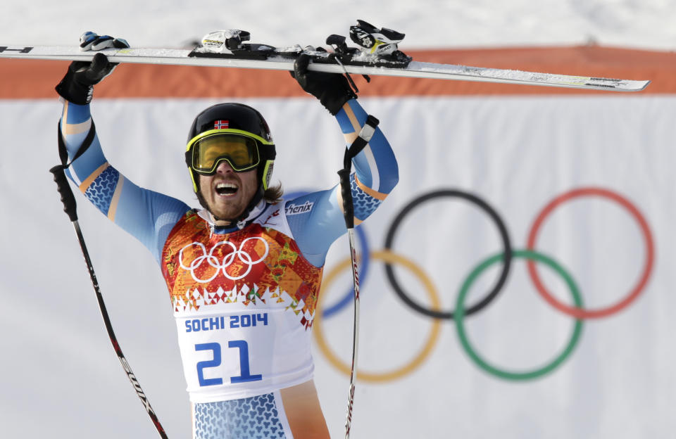 Norway's Kjetil Jansrud celebrates after his run in the men's super-G at the Sochi 2014 Winter Olympics, Sunday, Feb. 16, 2014, in Krasnaya Polyana, Russia.(AP Photo/Gero Breloer)