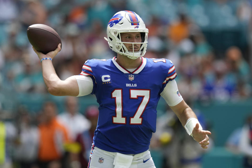 Buffalo Bills quarterback Josh Allen (17) aims a pass during the first half of an NFL football game against the Miami Dolphins, Sunday, Sept. 25, 2022, in Miami Gardens, Fla. (AP Photo/Rebecca Blackwell)