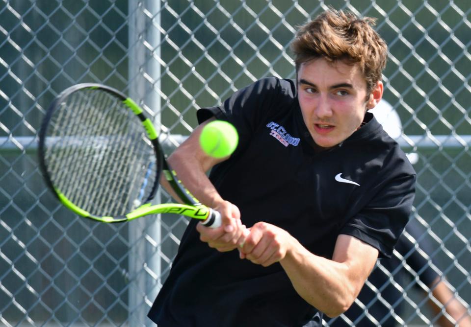 Tech's Michael Plombom returns a serve during the match against Monticello Wednesday, May 18, 2022, at Tech High School.