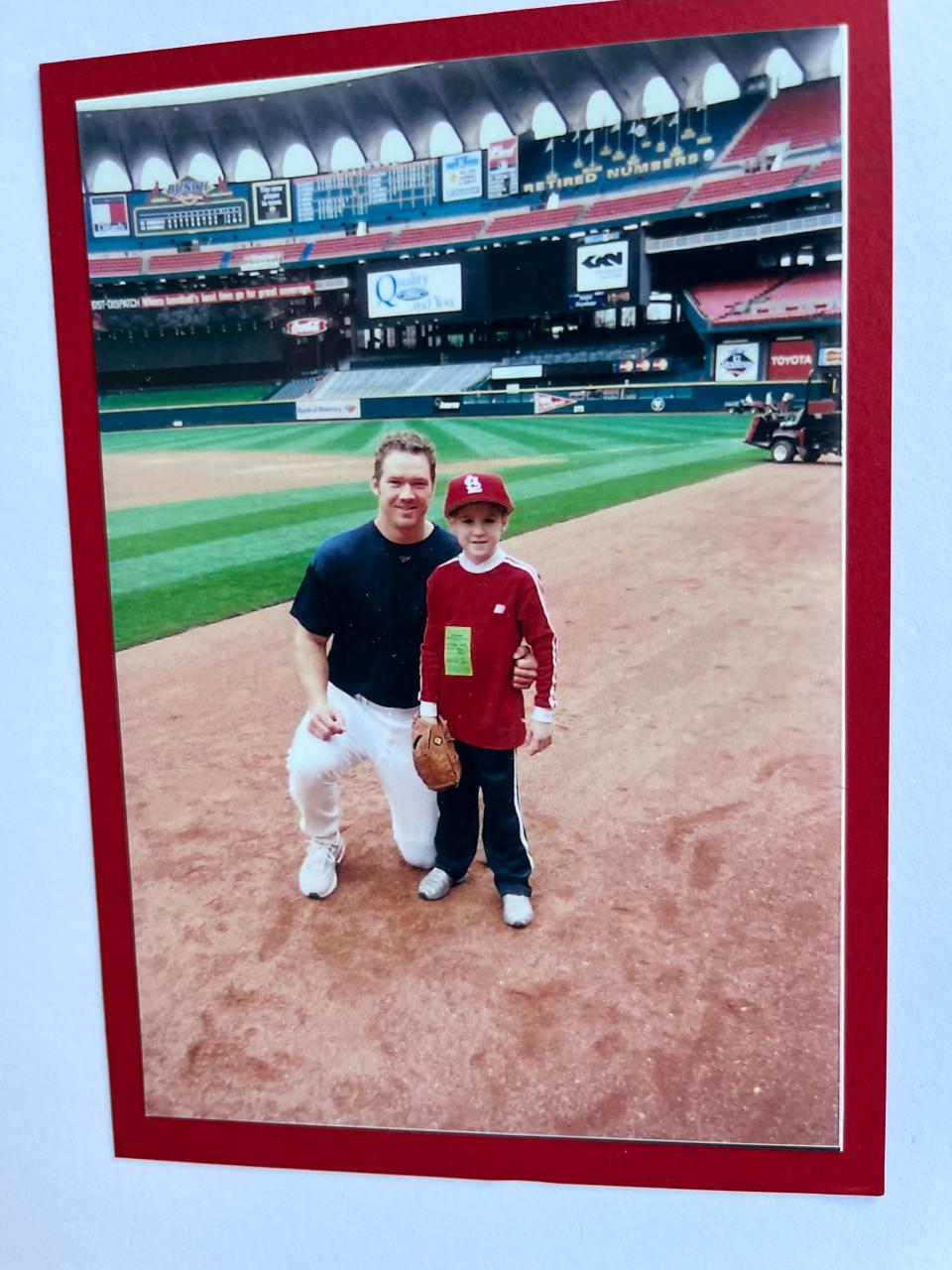 Tyler Frenzel (right) on the field at Busch Stadium with Scott Rolen in April 2003. Tyler had been diagnosed with leukemia four months earlier.