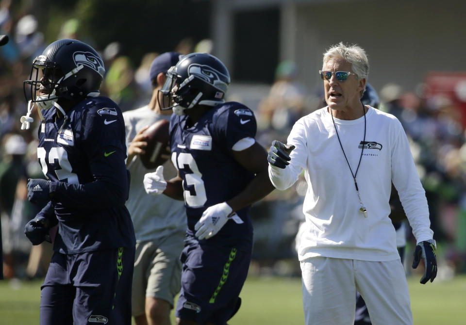 Seattle coach Pete Carroll had to help restore order at training camp on Thursday after a fight broke out between his offensive and defensive linemen. (AP)