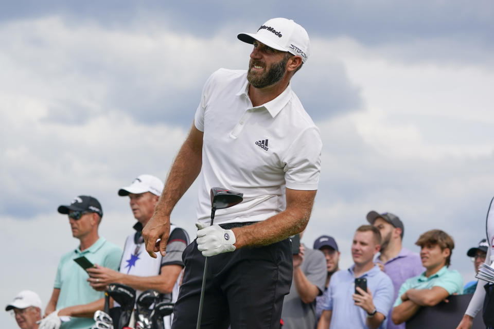 Dustin Johnson watches his shot off the 10th tee during the final round of the Bedminster Invitational LIV Golf tournament in Bedminster, N.J., Sunday, July 31, 2022. (AP Photo/Seth Wenig)