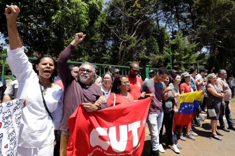 Supporters of Venezuela's President Nicolas Maduro block the entrance to Venezuelan embassy in Brasilia