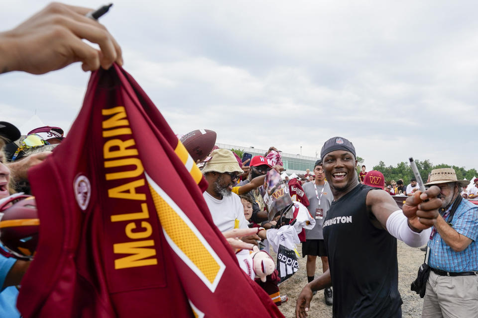 Washington Commanders wide receiver Terry McLaurin smiles as he greets fans after an NFL football practice at the team's training facility, Thursday, July 27, 2023, in Ashburn, Va. (AP Photo/Alex Brandon)