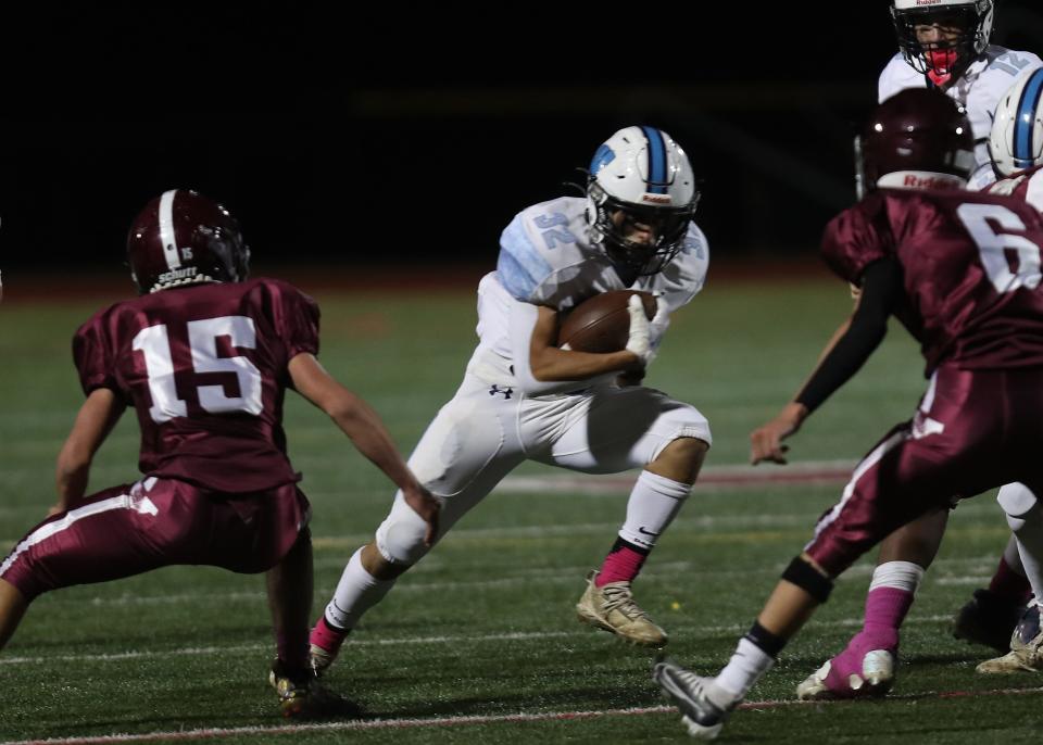 Westlake's Christian Occhipinti (32) looks for some running room in the Valhalla defense during football action at Valhalla High School Oct. 21, 2022. 