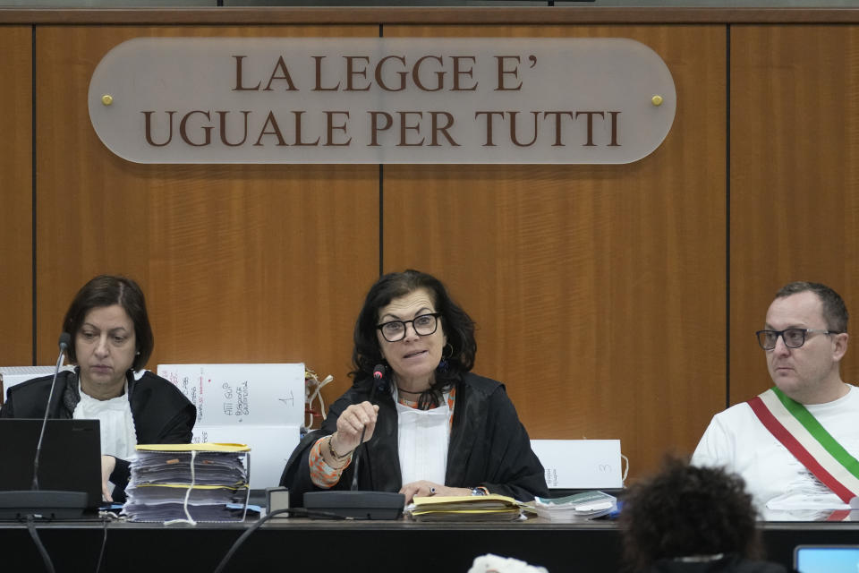 President of the court Paola Roja gestures during the start of the trial for the killing of Cambridge University researcher Giulio Regeni, at the Rome's court, Tuesday, Feb. 20, 2024. Four high-level Egyptian security officials are going on trial in absentia in a Rome court, accused in the 2016 abduction, torture and slaying of an Italian doctoral student in Cairo. (AP Photo/Andrew Medichini)