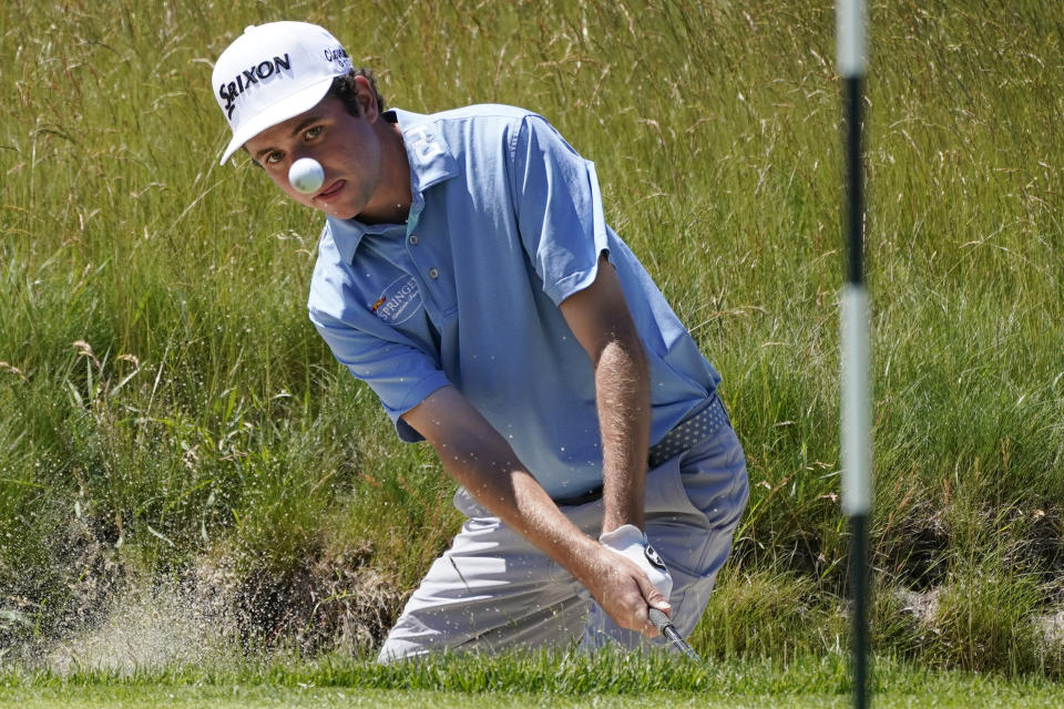 David Shore hits out of a bunker during a practice round ahead of the U.S. Open golf tournament, Tuesday, June 14, 2022, at The Country Club in Brookline, Mass. (AP Photo/Charles Krupa)