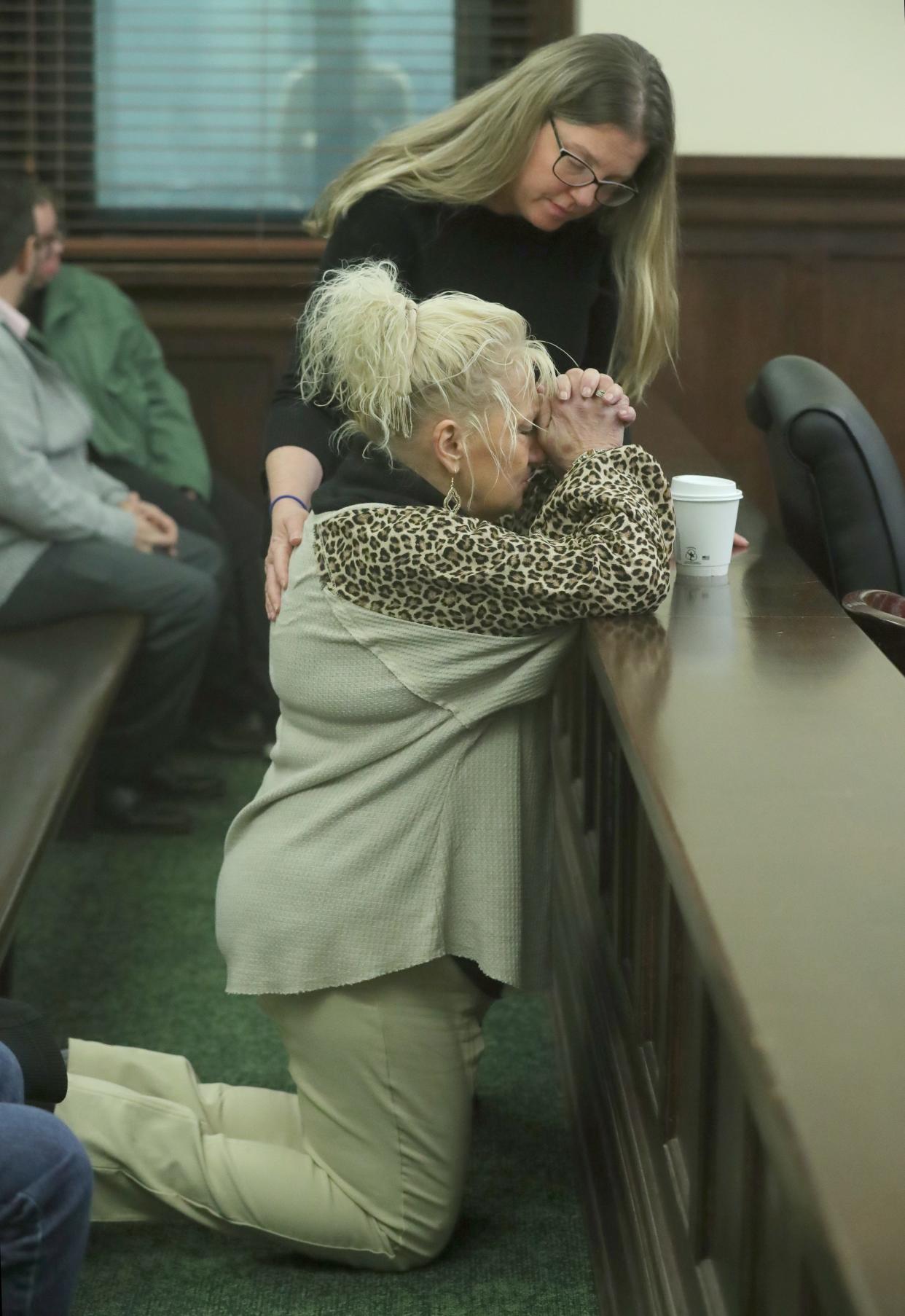 Kim Biggs, mother of murder victim Ashley Biggs, is comforted by victim advocate Katie Thompson while waiting for a jury to return with a verdict Wednesday in the Erica Stefanko trial in Akron.