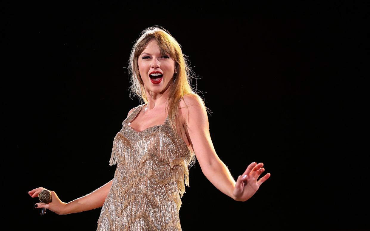 Taylor Swift performs onstage for her The Eras Tour