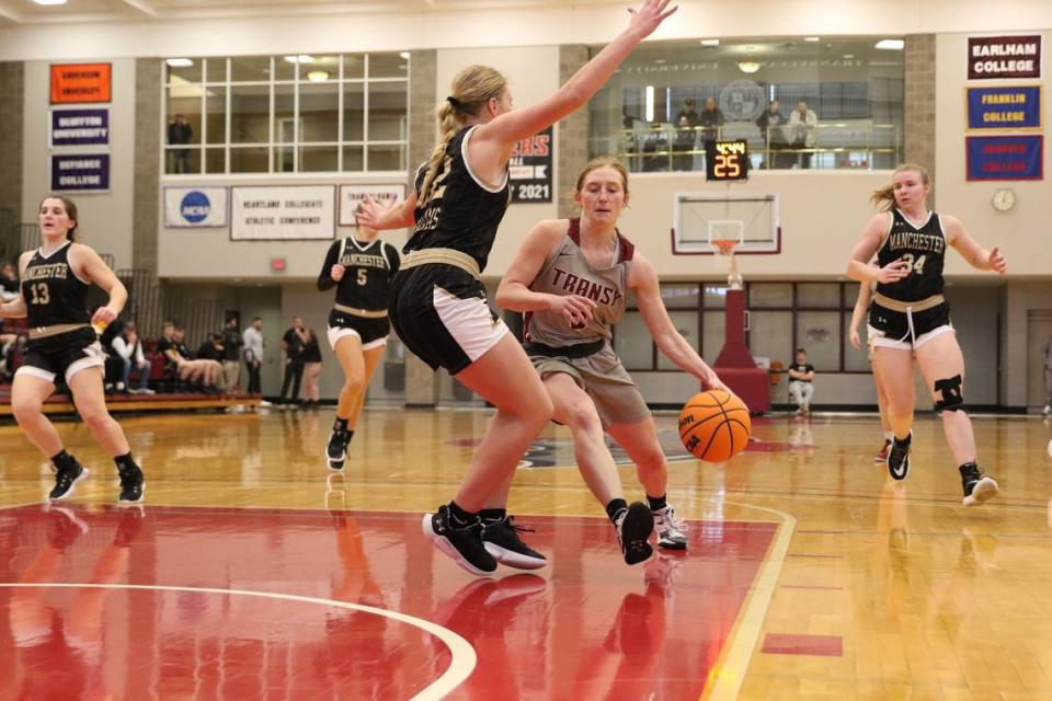 Madison Kellione, right, from Cynthiana, led Transylvania to a Division III national championship.