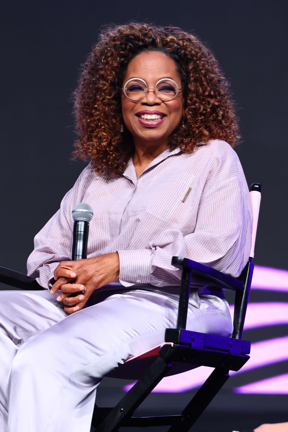 new orleans, louisiana june 30 oprah winfrey speaks onstage during from the page to the stage and beyond a discussion of the nearly 40 year legacy and impact of the color purple during the 2023 essence festival of culture and trade at ernest n morial convention center on june 30, 2023 in new orleans, louisiana photo by arturo holmesgetty images for essence