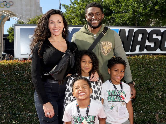 Kevin Winter/Getty Reggie Bush and Lilit Bush with their children: Agyeman, Briseis and Uriah Bush, attend NASCAR's Busch Light Clash at Los Angeles Coliseum on February 06, 2022 in Los Angeles, California.