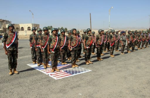 Troops of Yemen's Shiite Huthi rebels at a graduation ceremony in the northwestern city of Saada
