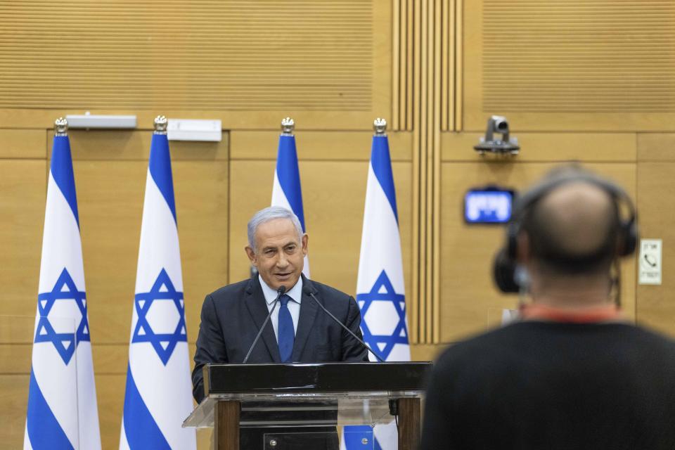 Israeli Prime Minister Benjamin Netanyahu speaks to the Israeli Parliament in Jerusalem, Sunday, May 30, 2021. (Yonatan Sindel/Pool via AP)