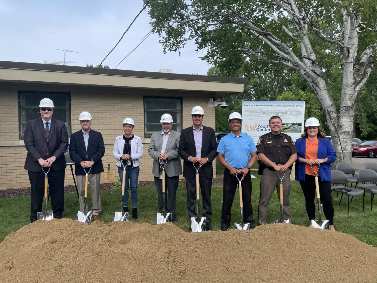 Calhoun County Chief Judge Michael Jaconette, Assistant Administrator Brad Wilcox, Administrator/Controller Kelli Scott, Calhoun County Board of Commissioners Vice Chair Steve Frisbie, CEO/President of E&L Construction Greg Kreuger, Senior Account Executive Eduardo Saplala from Veregy, Calhoun County Sheriff Steve Hinkley and Calhoun County Youth Center Director Tori Benden pose for a photo during a groundbreaking ceremony at the Youth Center Friday, Aug. 11.