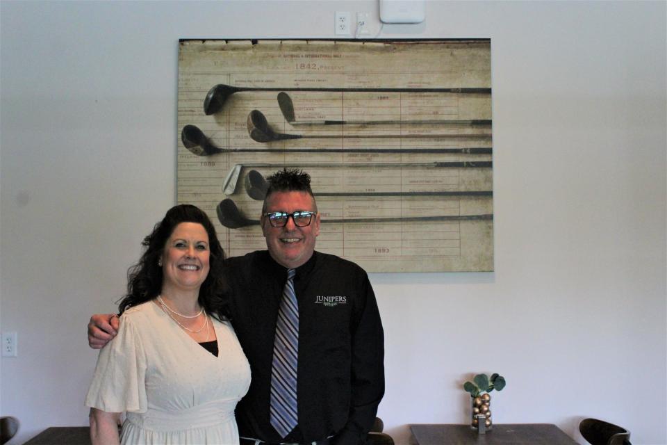 Sayre Hospitality Group Director of Human Resources Kimberly Siracuse and General Manager at the Junipers Restaurant Tracy Townsend stand in the newly renovated dining room at the Junipers.