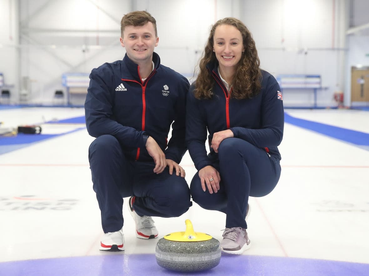 Scotland's Bruce Mouat, left, and Jennifer Dodds, seen in 2021, won the inaugural Mixed Doubles Super Series title with a 7-6 extra-end victory over Canada's Laura Walker and Kirk Muyres on Sunday at the Carleton Place Curling Club in Ottawa. (Ian MacNicol/Getty Images - image credit)