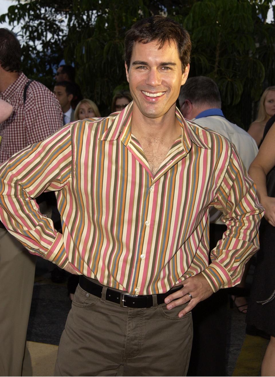 Eric McCormack in a stripped shirt