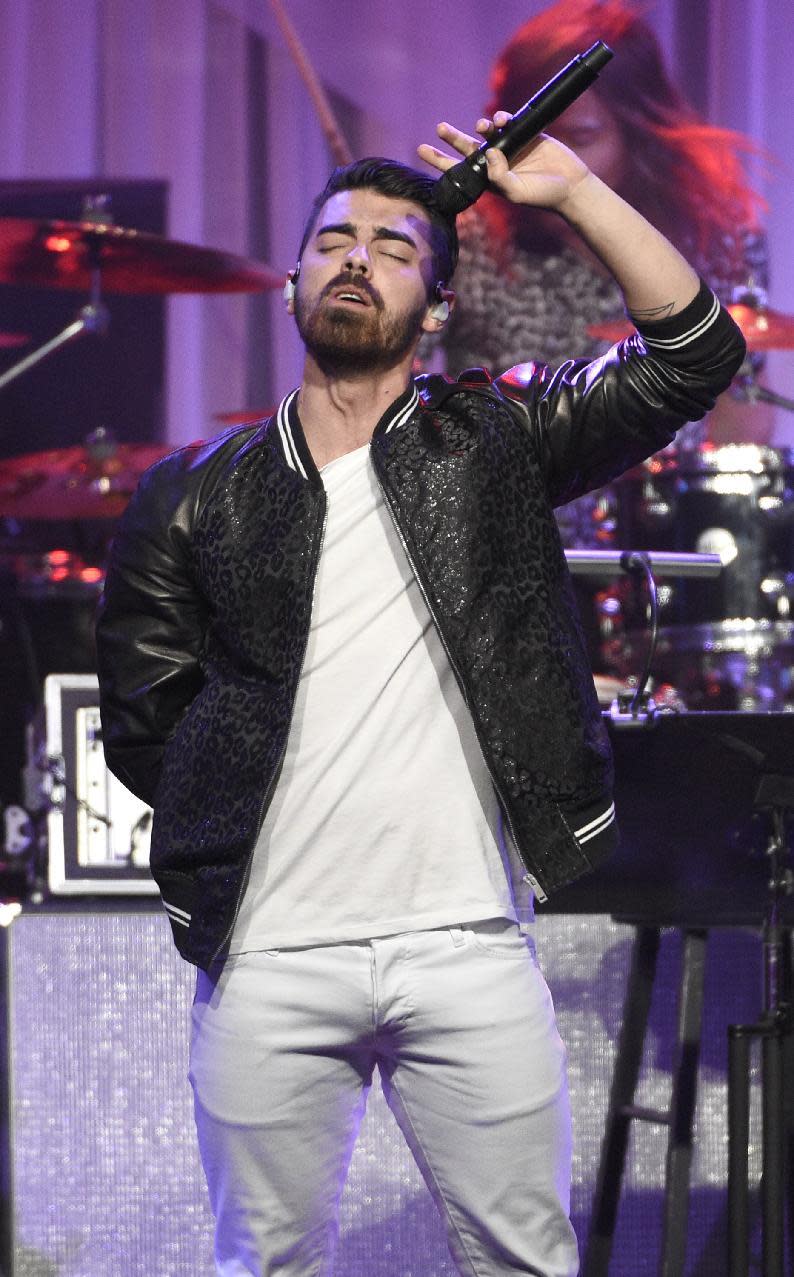 Joe Jonas performs at the Clive Davis and The Recording Academy Pre-Grammy Gala at the Beverly Hilton Hotel on Saturday, Feb. 11, 2017, in Beverly Hills, Calif. (Photo by Chris Pizzello/Invision/AP)