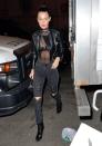 <p>Bella looked edgy in all-black as she arrived at Madison Square Garden in NYC for the McGregor-Alvarez UFC match. The model wore a sheer bodysuit over a black bra, paired with faded black jeans by Made Gold that featured lace-up detailing down the front, a leather jacket and Charlotte Olympia ankle boots. </p>