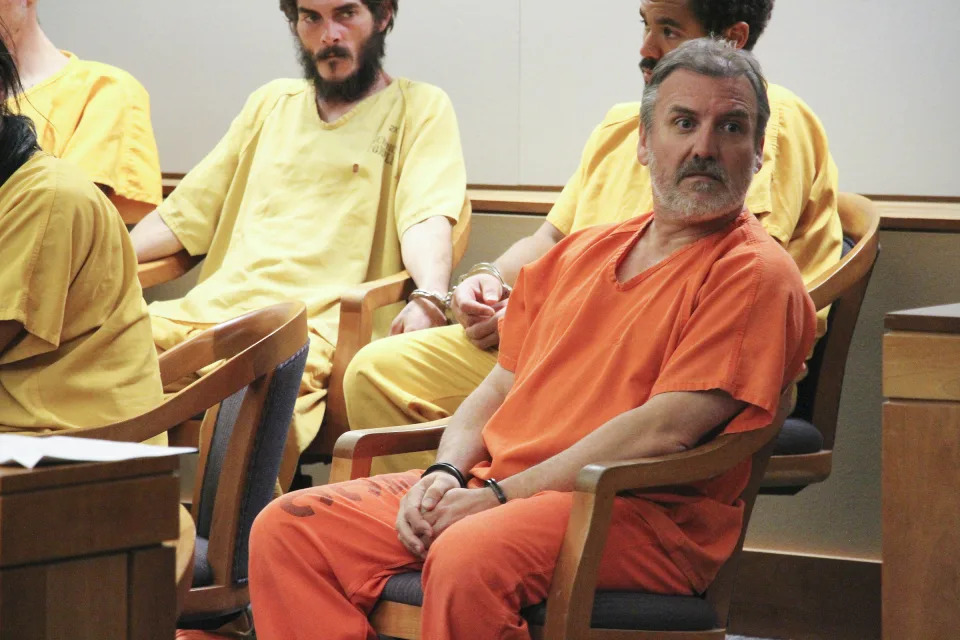 FILE - Brian Steven Smith sits in a courtroom in Anchorage, Alaska, Oct. 21, 2019. The double murder trial of Smith, a South Africa native accused of killing two Alaska Native women will begin this week, more than four years after a woman provided police with a digital memory card that authorities said contained images and video of one of the killings. (AP Photo/Mark Thiessen, File)