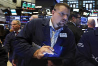 Trader Michael Milano works on the floor of the New York Stock Exchange, Wednesday, Sept. 4, 2019. Stocks are opening higher on Wall Street following big gains in Asia as Hong Kong's government withdrew a controversial extradition law that set off three months of protests there. (AP Photo/Richard Drew)