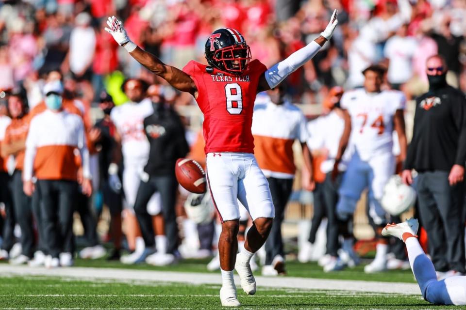 Cornerback Zech McPhearson #8 of the Texas Tech Red Raiders celebrates after breaking up a pass intended for receiver Brennen Eagles #13 of the Texas Longhorns during the second half of the college football game on September 26, 2020 at Jones AT&T Stadium in Lubbock, Texas. (Photo by John E. Moore III/Getty Images)