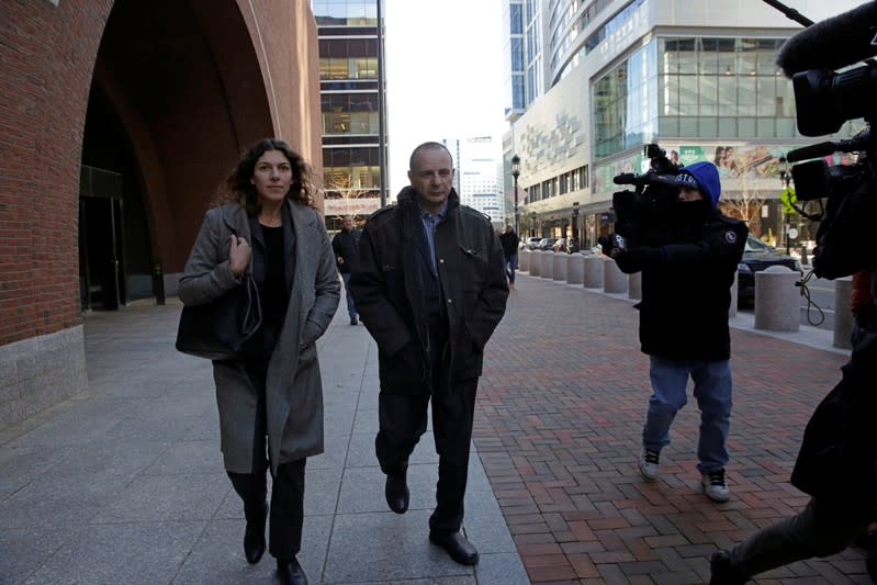 Test administrator Igor Dvorskiy leaves the federal courthouse in Boston